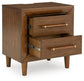 Lyncott King Upholstered Bed with Dresser and Nightstand